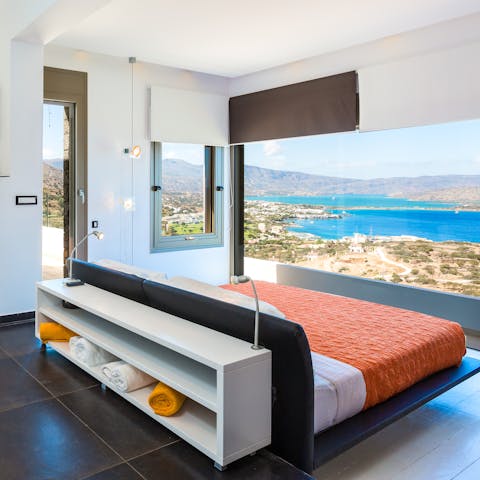 Gaze out at views of the beautiful landscape and seascape from the main bedroom