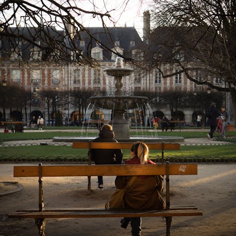 Eat croissants at nearby Places des Vosges and watch the world go by