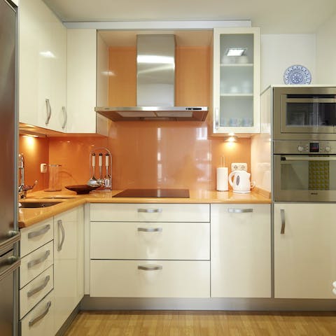 Find all the amenities you need for extended stays in the kitchen