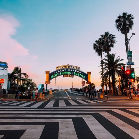 Take the eight-minute minute drive to the Santa Monica Pier