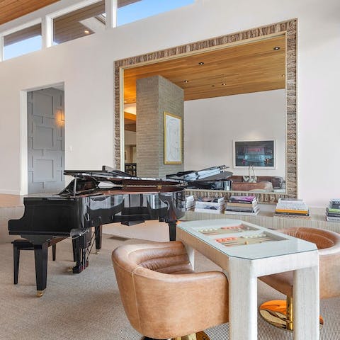 Play the piano or backgammon in the expansive living space