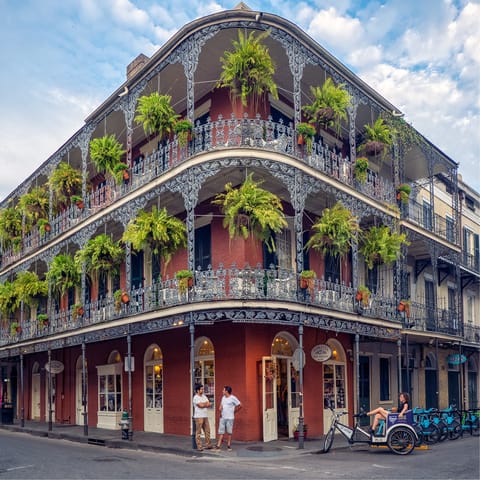 Head to the jazz clubs on Bourbon Street, twenty-five minutes on foot