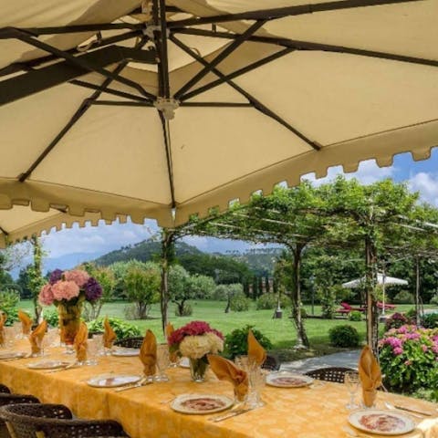 Indulge in long lunches on the shaded patio with a view of Tuscany's hills 