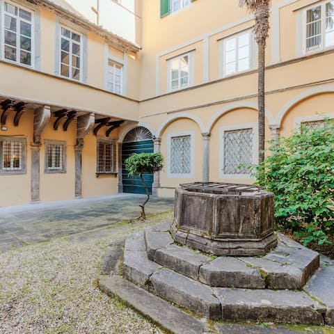 Sip your morning coffee in the peaceful renaissance courtyard the apartment faces