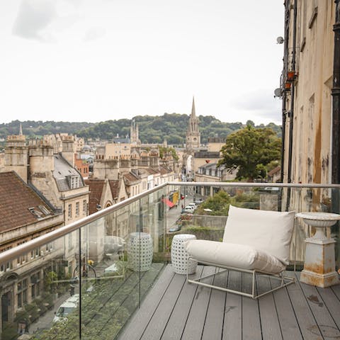 Admire the views of Bath Abbey and the wooded hills beyond from the balcony