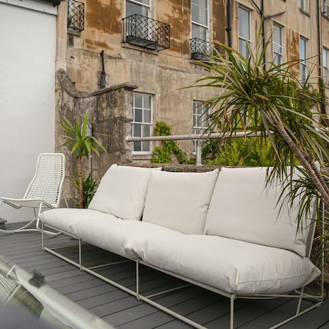 Enjoy cocktails on the comfy sofa on the roof terrace