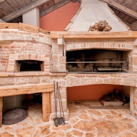 Get a real rustic feast going in the outdoor bread oven and wood-fired grill