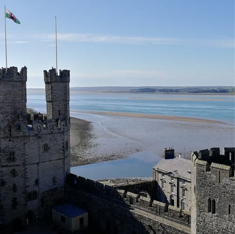 Enjoy the costal beauty and historic landmarks of Caernarfon