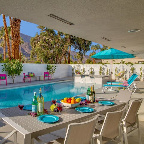 Dine alfresco on the poolside terrace