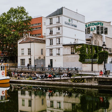 Explore Canal Saint Martin, just a ten-minute walk away