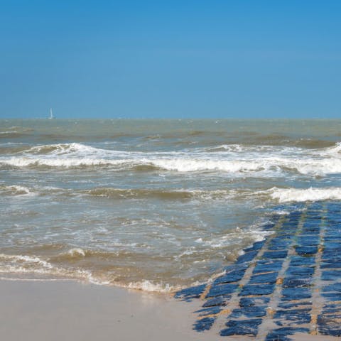 Spend your days on the sandy Strand De Haan, right down the street