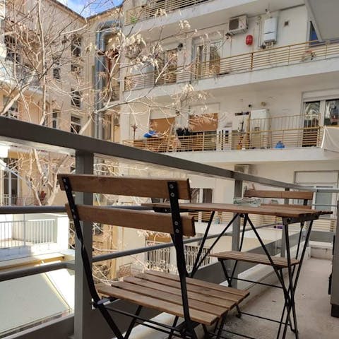 Get some fresh air while you enjoy your morning coffee in the seating area on the balcony