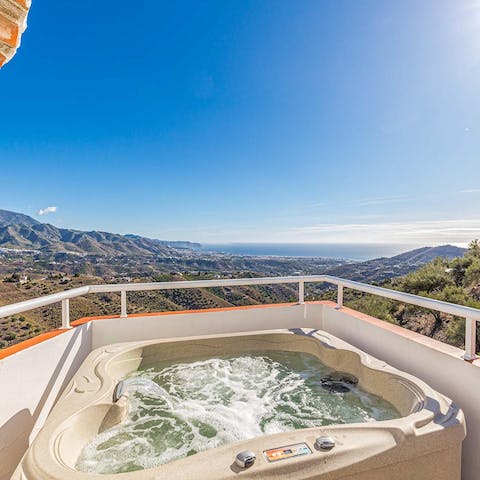 Relax in a jacuzzi overlooking the Spanish hills