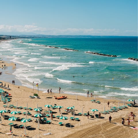 Spend the day sunbathing on Spiaggia Rio Forgia, minutes away