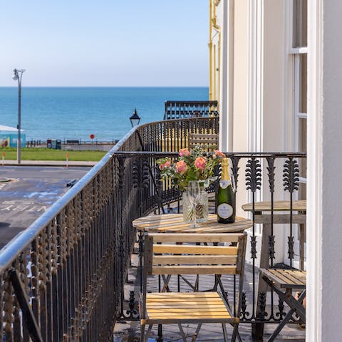 Grab a sundowner and head out onto the balcony to soak up the sea vistas