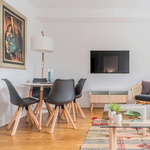 Share an aperitif of Spanish wine and tapas at the dining area