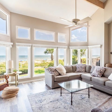 Lay back and read in the plush living room with pristine ocean views