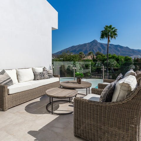 Relax and share some Spanish wine on the comfy terrace