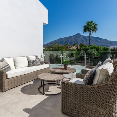 Relax and share some Spanish wine on the comfy terrace 