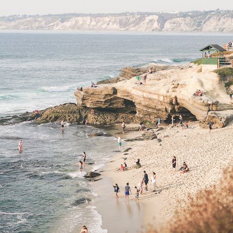 Visit La Jolla Cove, it's only a ten-minute drive from your home