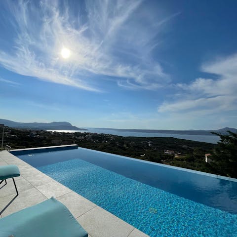 Immerse yourself in the spectacular scenery from the private infinity pool