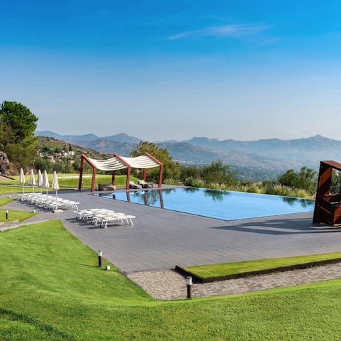 Admire those breathtaking views from your garden and pool area 