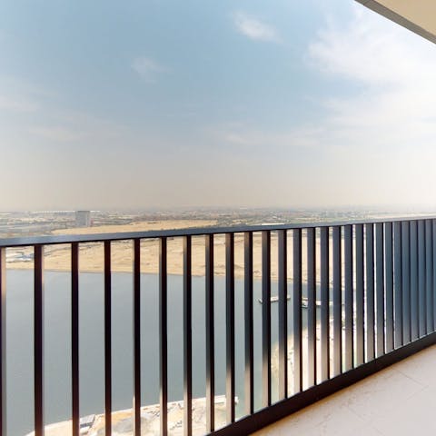 Take in the views over the Dubai Creek from the private balcony