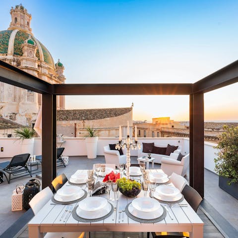 Dine out on the terrace as the sunsets, with views of the sea and the city 