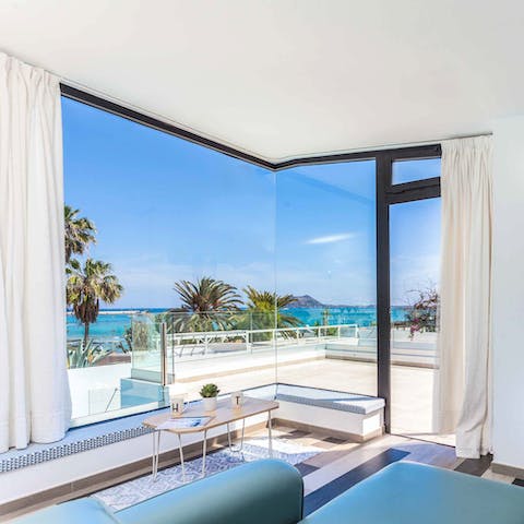 Stretch out on the sofa and soak up the sea views