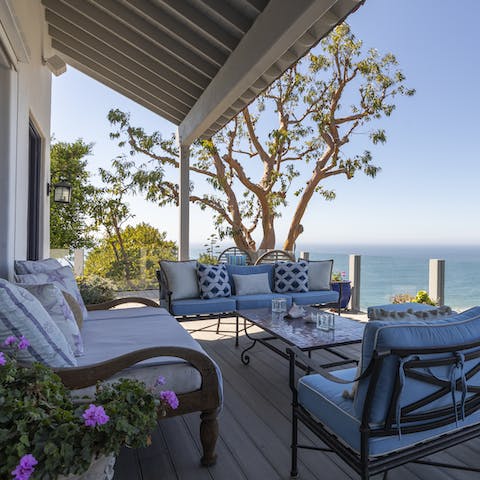 Breathe in the fresh ocean air from the outside deck 