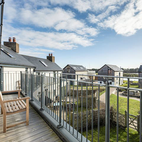 Wake up to views of the lake from the bedroom balcony