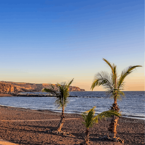Sink your feet into the sand at nearby Playa La Caleta beach
