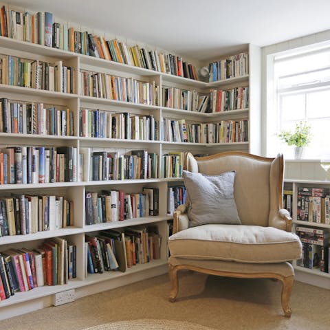 Pick a book from the library shelves and enjoy a peaceful afternoon reading