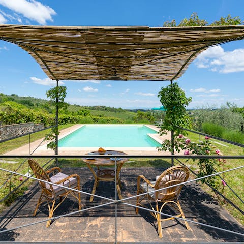 Enjoy your morning coffee under the gently shaded veranda