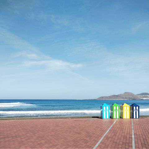 Stroll along the golden sand of the gorgeous Las Canteras beach and work on your tan by the waves