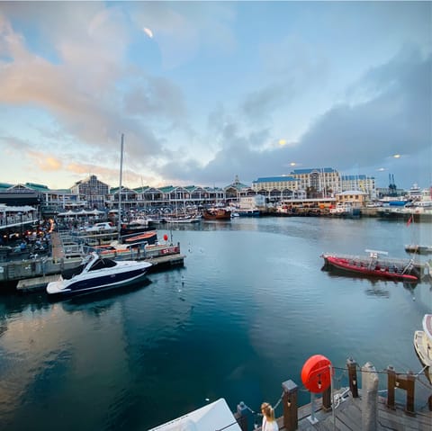 Soak up the beauty of the V&A Waterfront, a short walk away