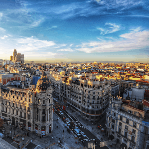 Explore the vibrant city of Madrid from your location in the Azca District