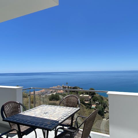 Dine alfresco on your own private balcony and look out at the stunning horizon