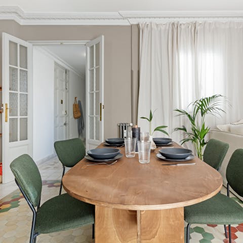 Share tapas and other delights around the mid-century dining table