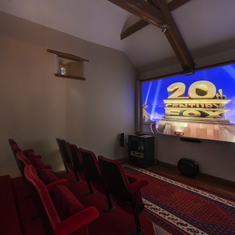 Gather the group for the full cinema experience in the home theatre
