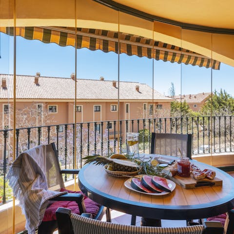 Dine alfresco on your beautiful balcony