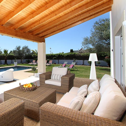Chill out with a cocktail on the outdoor sofas when you need a break from the sun