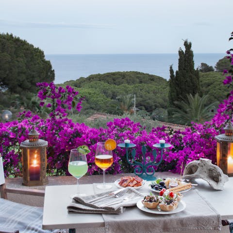 Enjoy an refreshing Spritz overlooking sparkling seascape