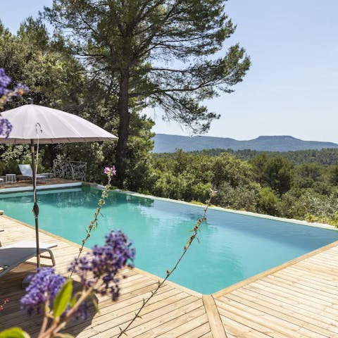 Soak up the sun by the private pool after a swim