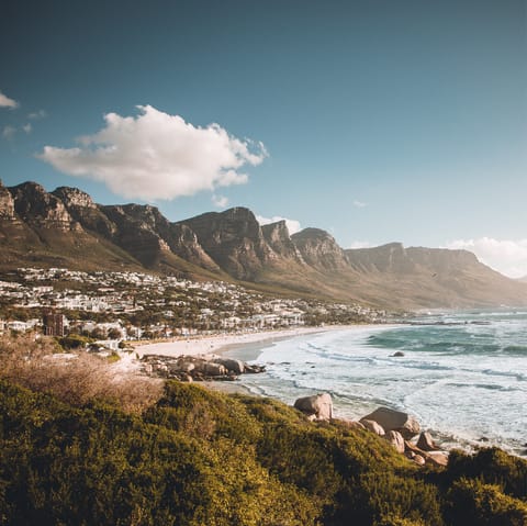 Wander the beach and sip cocktails in trendy bars in Camps Bay