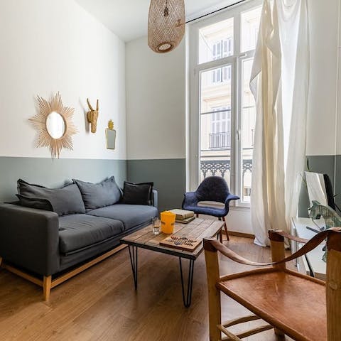Relax in the stylish living space after a day exploring the city