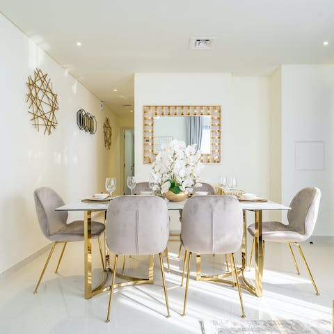Dine in style in the chic open-plan living and dining room