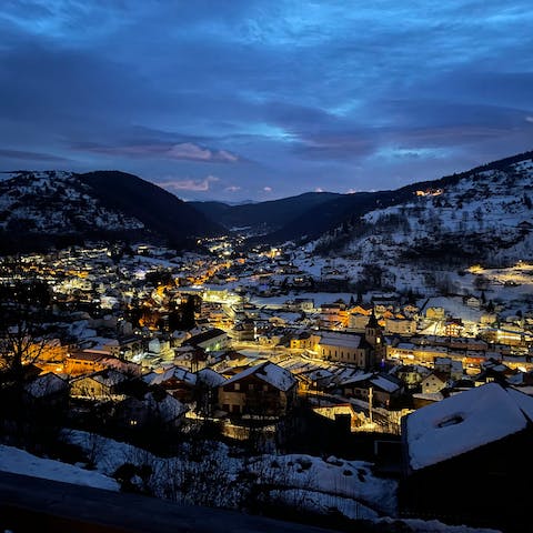 Sit out after sunset to admire the orange glow of the town below