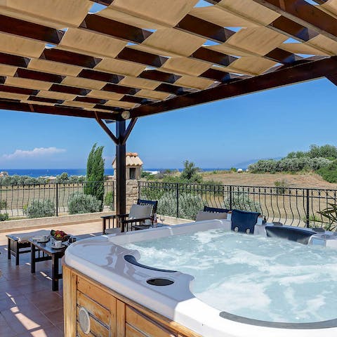 Soak up the sea views from the hot tub on the roof terrace