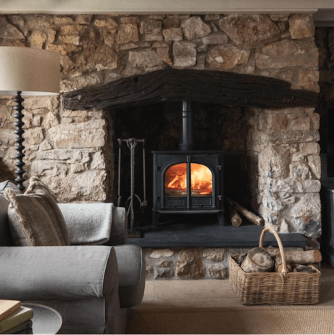 Light the log burner, and get cosy on the sofa with a chilled glass of wine 